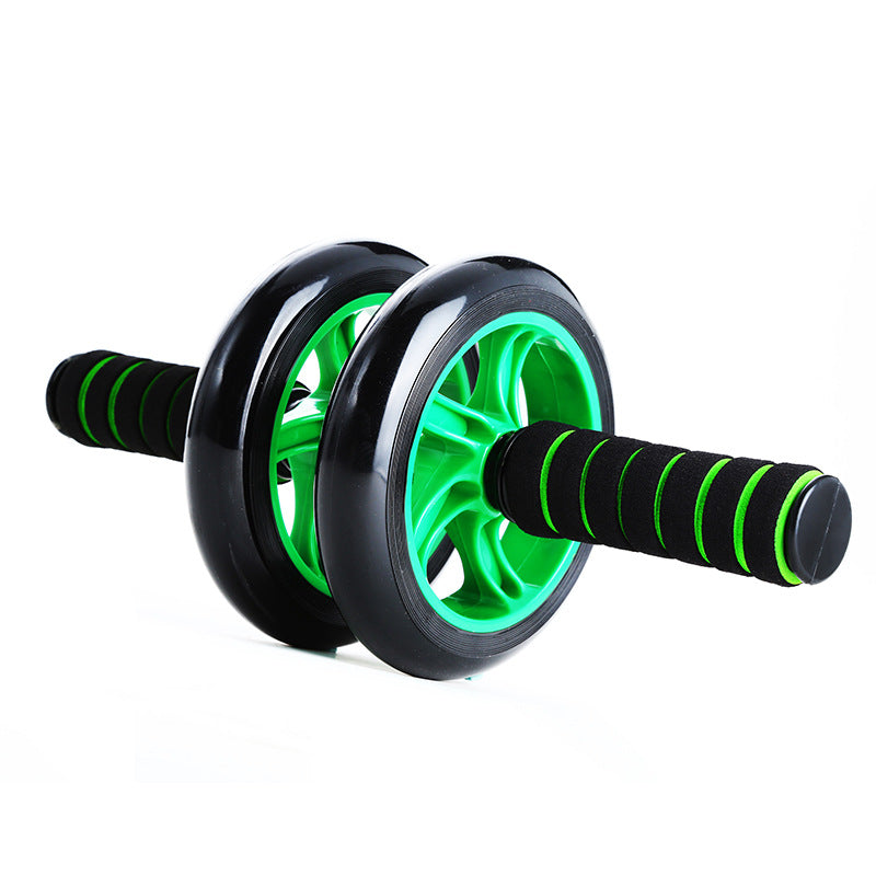 Black and green ab roller on a white background